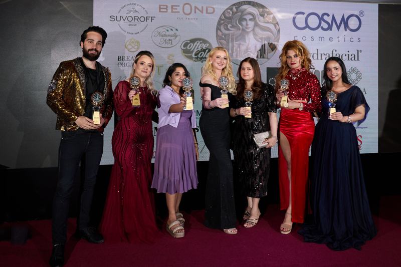 Winners holding their IDBA 2025 trophies