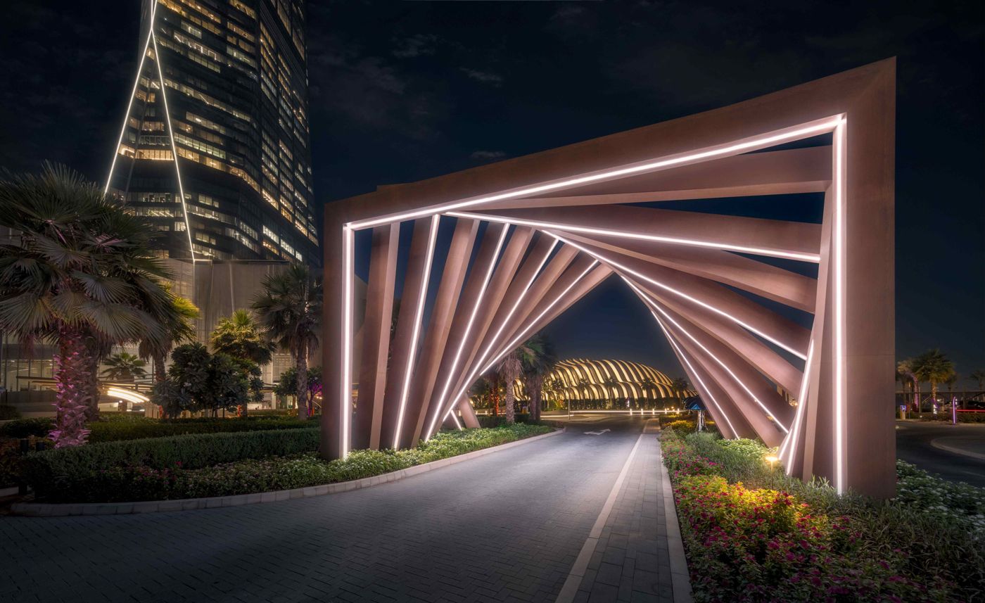 Plaza Downtown DMCC, illuminated entrance arch at night